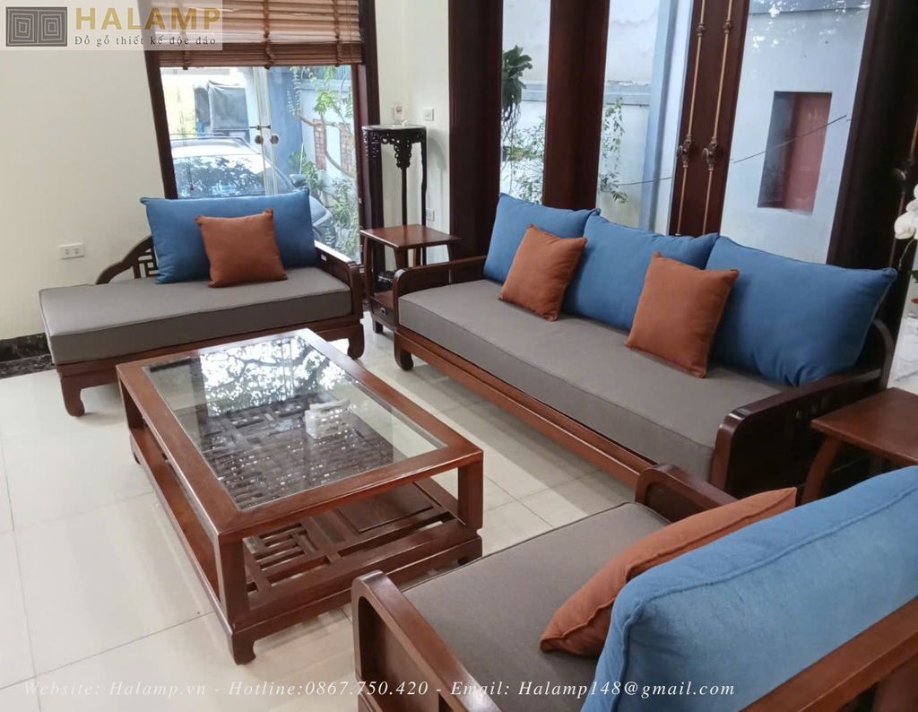 Bộ ghế sofa grand bois gỗ gụ với đệm ghế ghi xám gối màu xanh