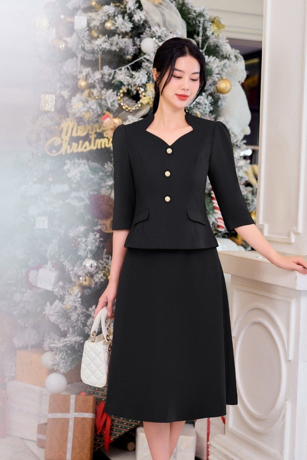 Đầm set vest đen dự tiệc trung niên