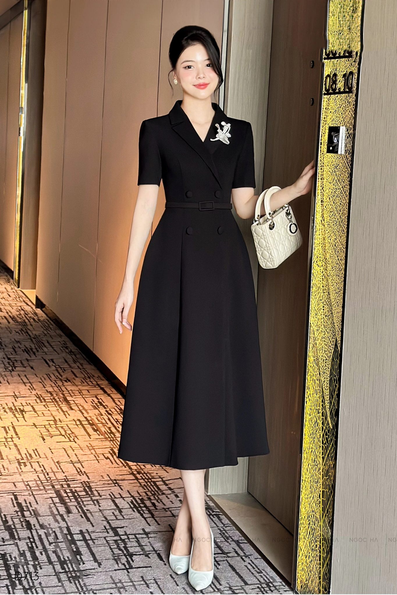 Đầm vest cộc tay dáng xòe màu đen