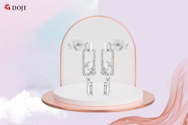 Đôi bông tai vàng trắng với họa tiết hình khối chữ nhật đứng sắc nét, mang đến vẻ cool ngầu và phá cách.