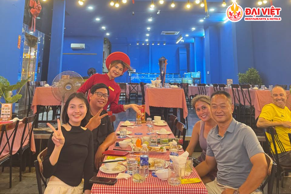 Customers enjoy a delightful meal in the cozy ambiance of Bien Dai Viet.