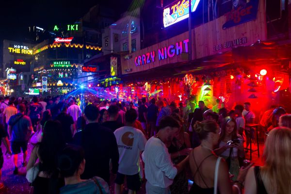 The atmosphere in Bui Vien is extremely lively and crowded with tourists