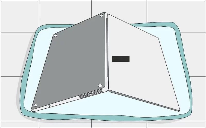 Lật ngược laptop hình chữ V khi không may bị đổ nước