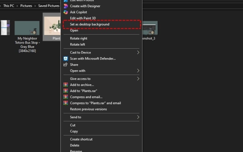 Chọn Set as desktop background để cài hình nền laptop