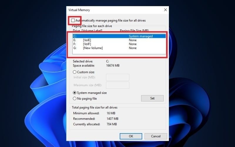 Bỏ tick Automatically manage paging file size for all drives và thiết lập