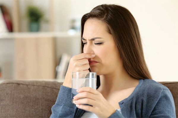 nước mùi vị lạ