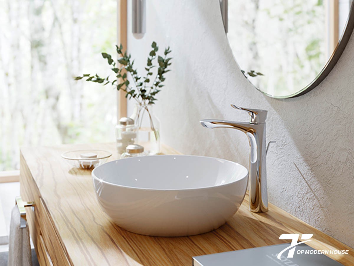 Lavabo TOTO LT1706 được làm từ sứ cao cấp phủ men CeFiONtect, bền đẹp và chống bám bẩn hiệu quả.