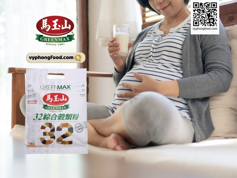 Young pregnant woman reading a book about “can pregnant women drink multi grains cereal”, Greenmax multi grains cereal branding visible, vyphongfood.com credit.