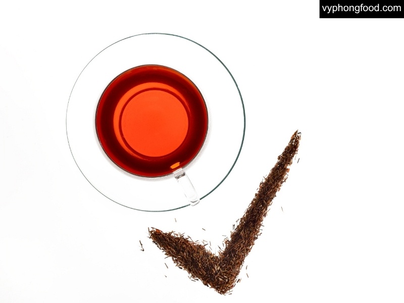 Steaming cup of South African rooibos tea to start the New Year right—caffeine-free herbal drink for better sleep, stress relief and hydration; African Dawn teabags.