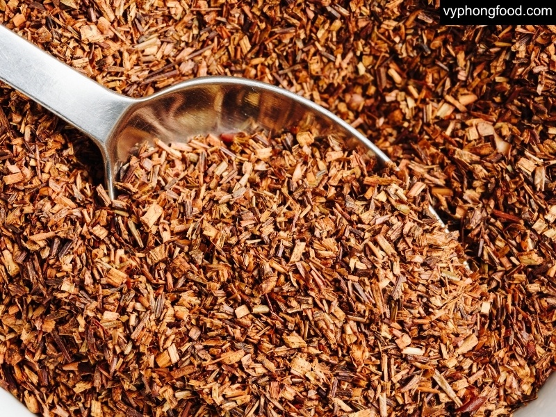 South African rooibos tea in a cup, highlighting 9 health benefits: caffeine-free sleep support, antioxidants (aspalathin), digestion comfort, blood sugar control, bone health, and weight management.