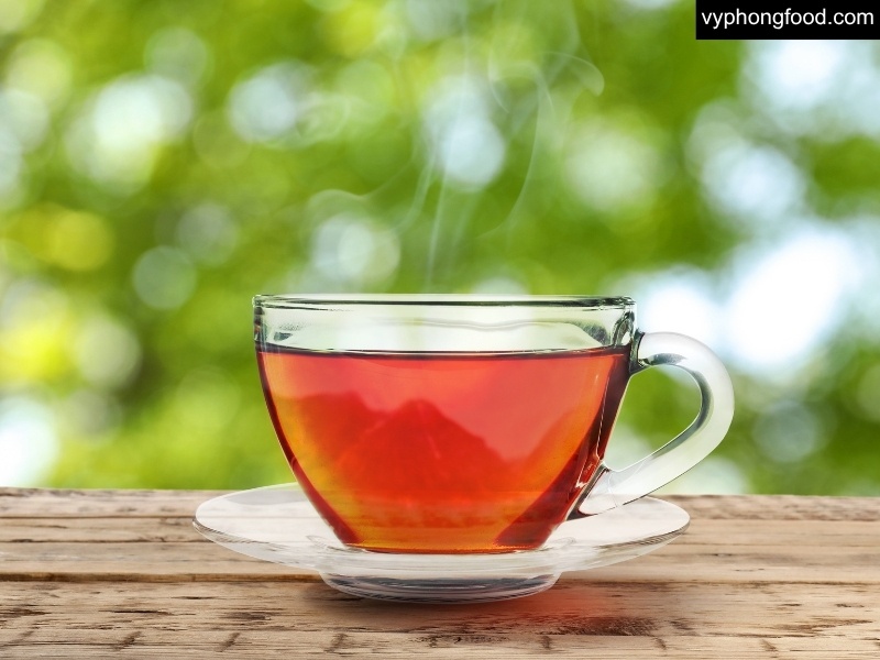 South African rooibos tea image highlighting five smart ways to cut caffeine for better sleep and focus: replace coffee and sodas, choose green rooibos, eat a light evening meal, reduce alcohol, and create a caffeine-free bedtime routine.