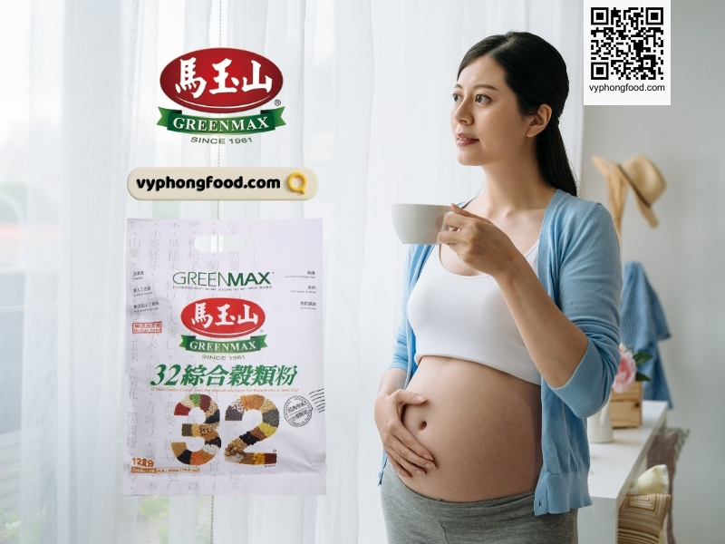 Pregnant woman reading a guide about how to drink multi grains cereal safely by pregnancy stage - Greenmax prenatal cereal advice from vyphongfood.com.