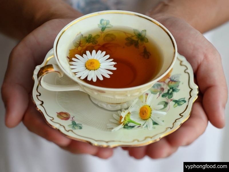 A cup of South African Rooibos tea on International Tea Day, highlighting sustainable farming, fairtrade certification, and the health benefits of caffeine-free herbal tea.