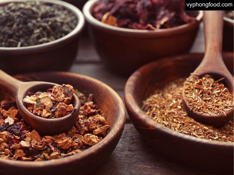 Cup of South African Rooibos tea beside a cozy winter setting—caffeine-free, antioxidant-rich herbal drink that soothes, warms, and supports relaxation for better sleep; ideal bedtime routine in convenient African Dawn teabags.