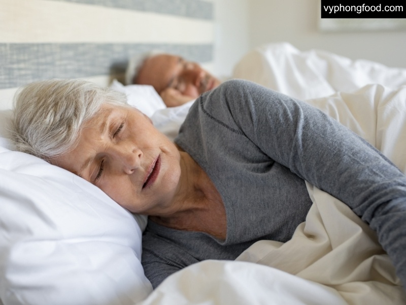Cup of South African Rooibos Tea on a bedside table, illustrating a caffeine-free bedtime routine with science-based nutrition tips and a 7-day plan to improve sleep quality.
