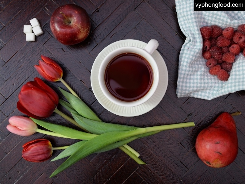 Couple enjoying South African rooibos tea on Valentine’s night—caffeine-free herbal drink that supports better sleep and wellness; African Dawn teabags.