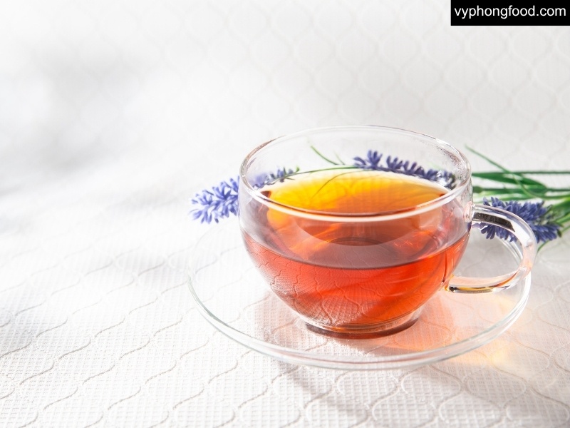 Couple enjoying South African rooibos tea on Valentine’s night—caffeine-free herbal drink that supports better sleep and wellness; African Dawn teabags.