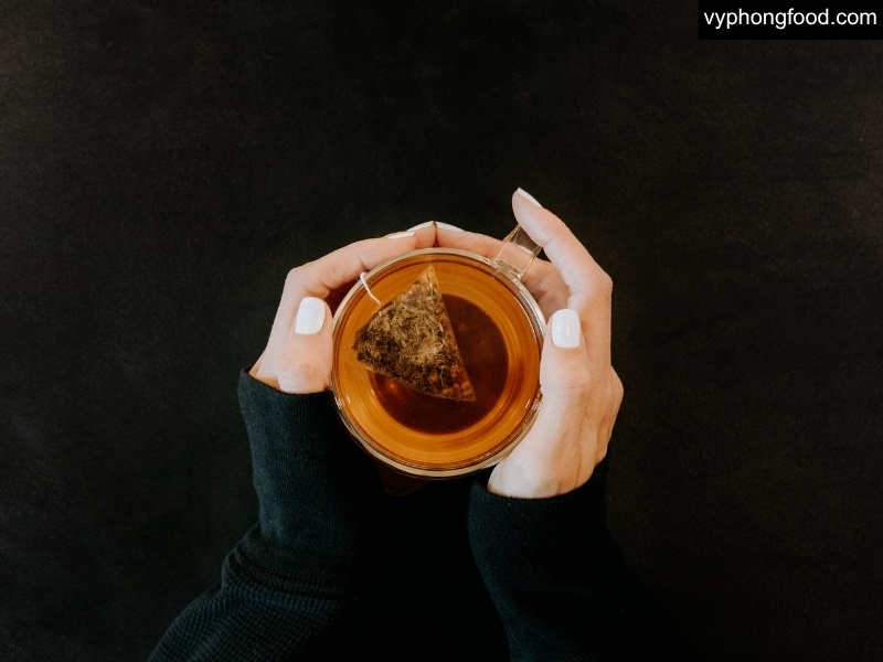 South African Rooibos Tea showing reddish-brown leaves and a brewed cup; signature taste driven by Cederberg terroir, fermentation/oxidation, and sun-dried processing; caffeine-free, low-tannin with smooth honey–caramel notes.