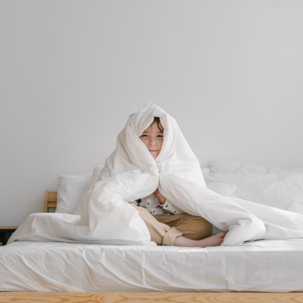 boy feeling cold in air-conditioned room