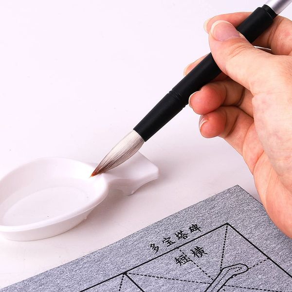 Bút lông cầm đúng tư thế