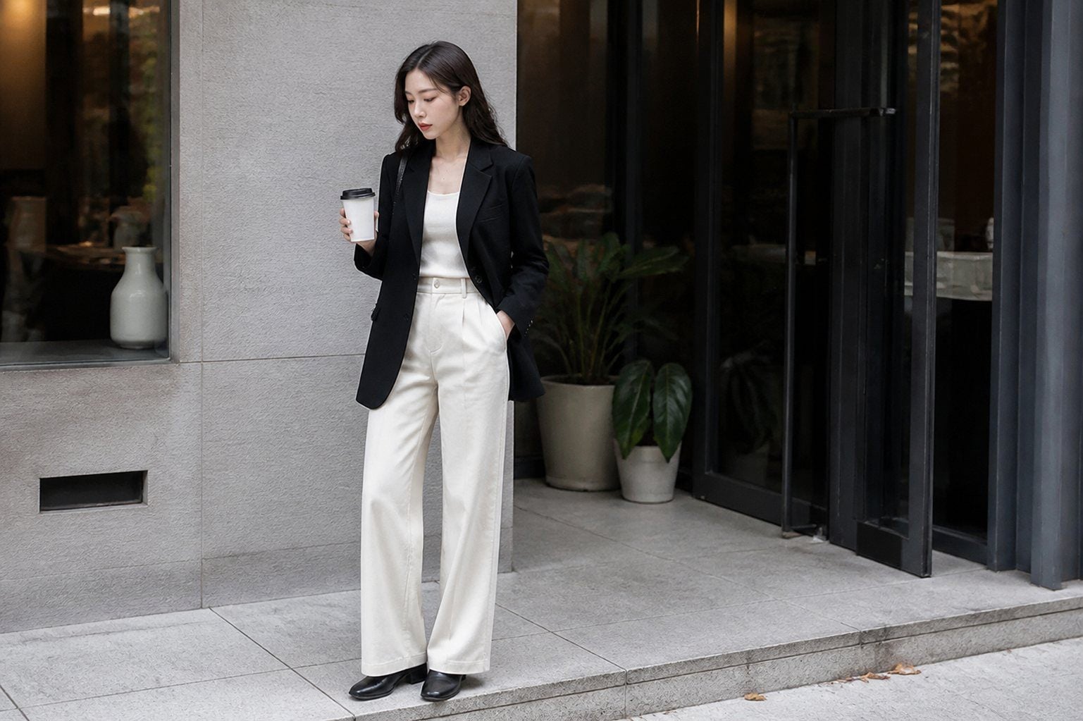 Vest đen nữ cho người muốn che bụng