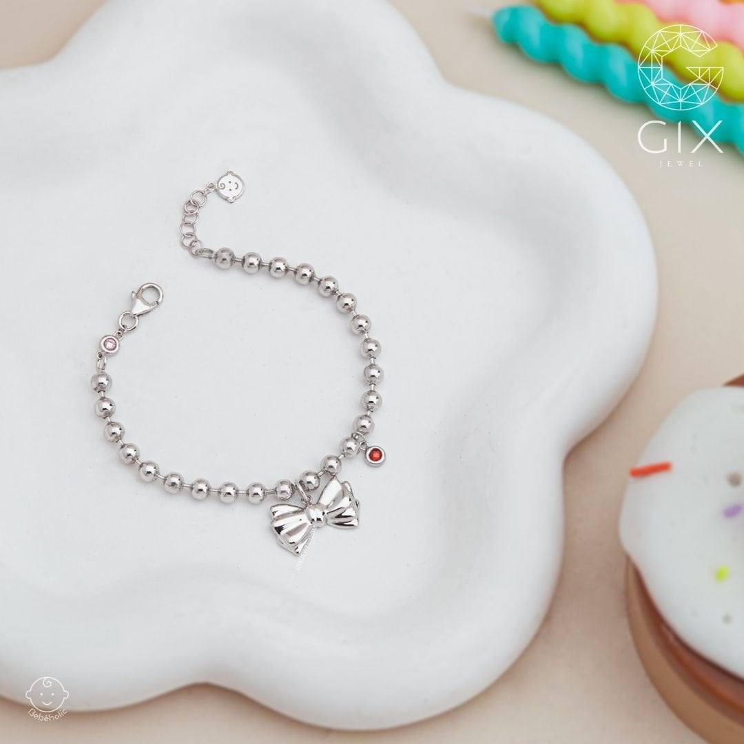 Lắc tay trẻ em mặt nơ ruy băng nhỏ xinh, phù hợp làm quà tặng cho bé