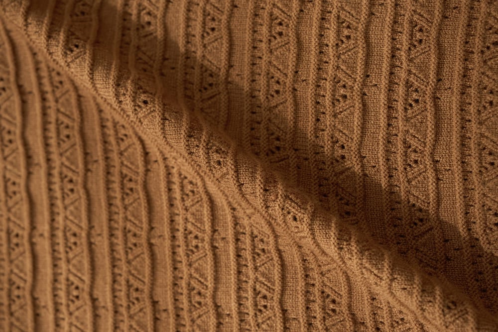 Áo len tay lỡ cổ sen phối viền