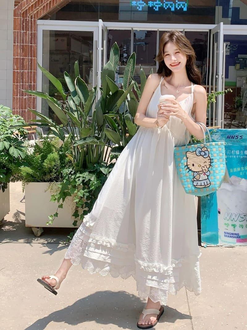 Váy maxi trắng đi biển