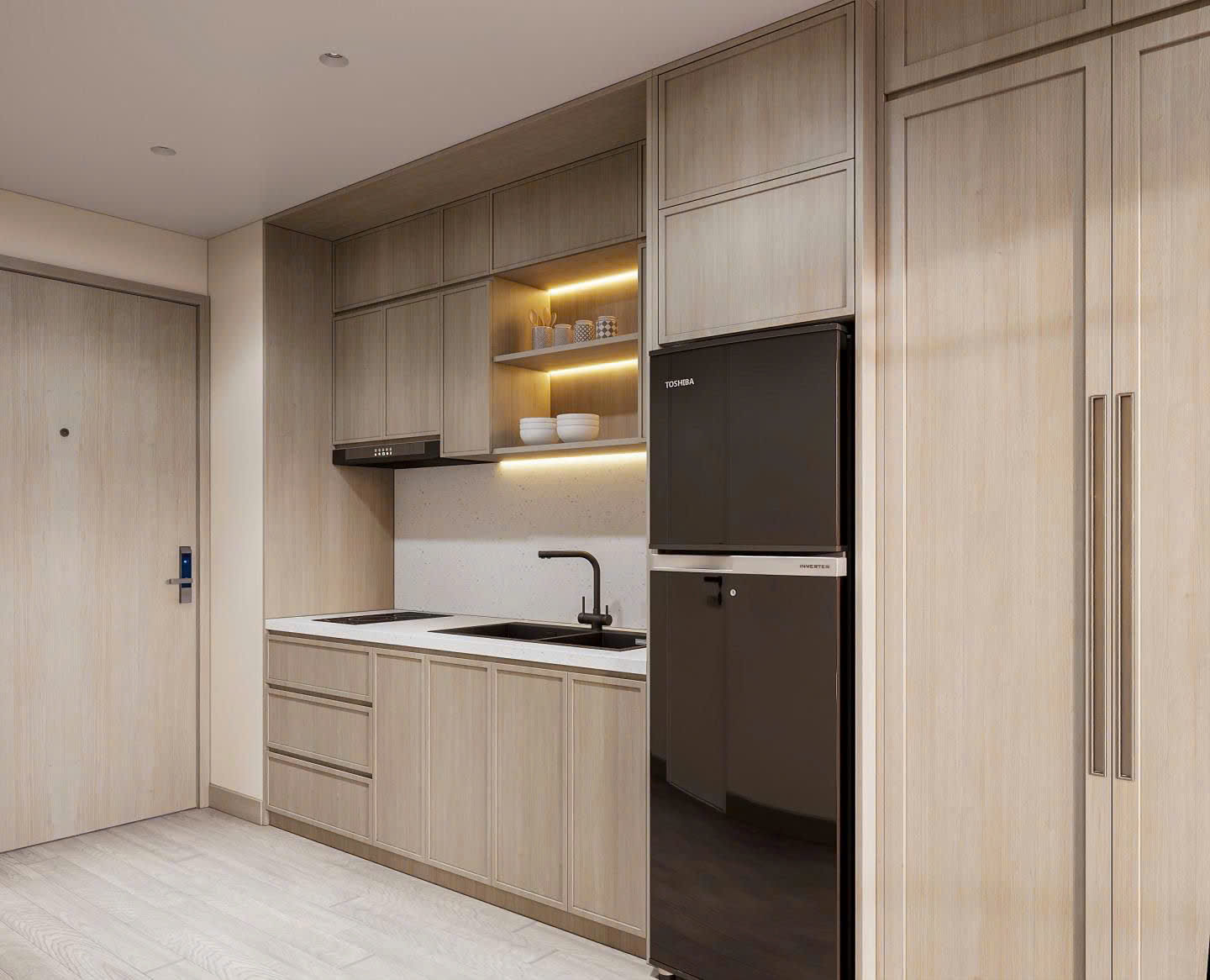 Không gian phòng khách liền bếp hiện đại trong căn hộ Studio The Onsen với gam màu trung tính.