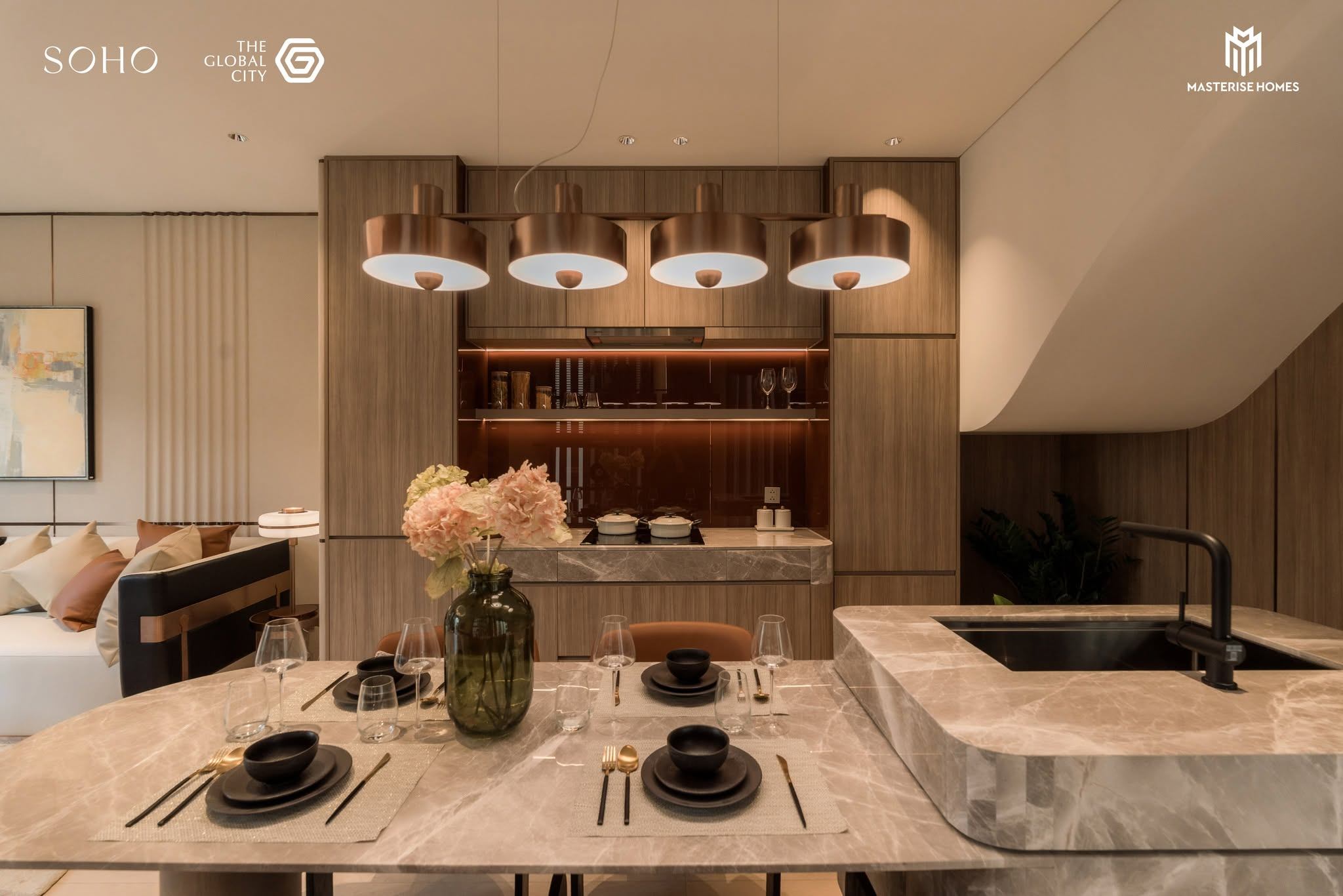 Không gian liên thông giữa bếp và phòng khách tại SOHO Social Club Masterise Homes