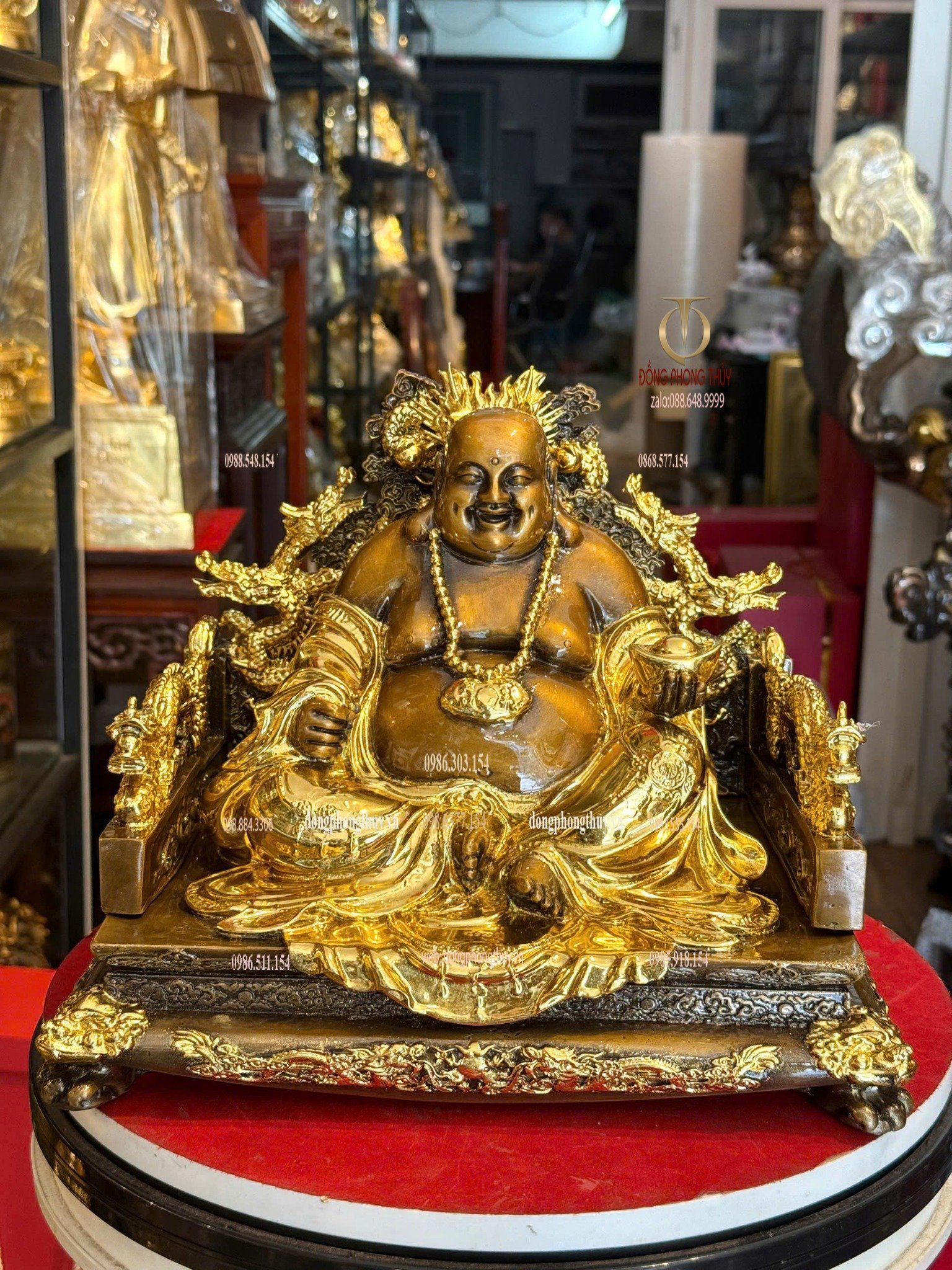 Tượng di lặc bằng đồng dát vàng điểm