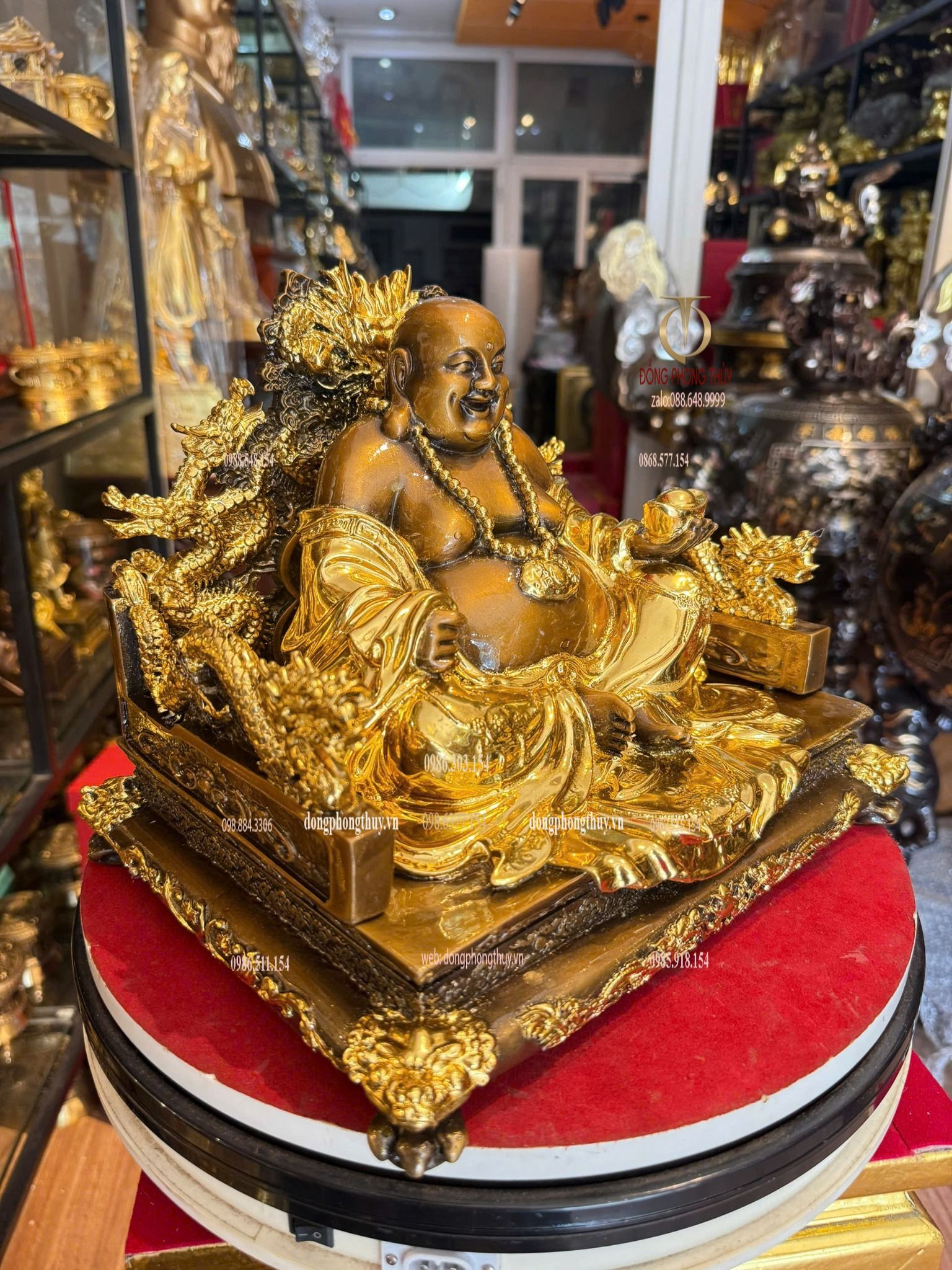Tượng di lặc bằng đồng dát vàng điểm