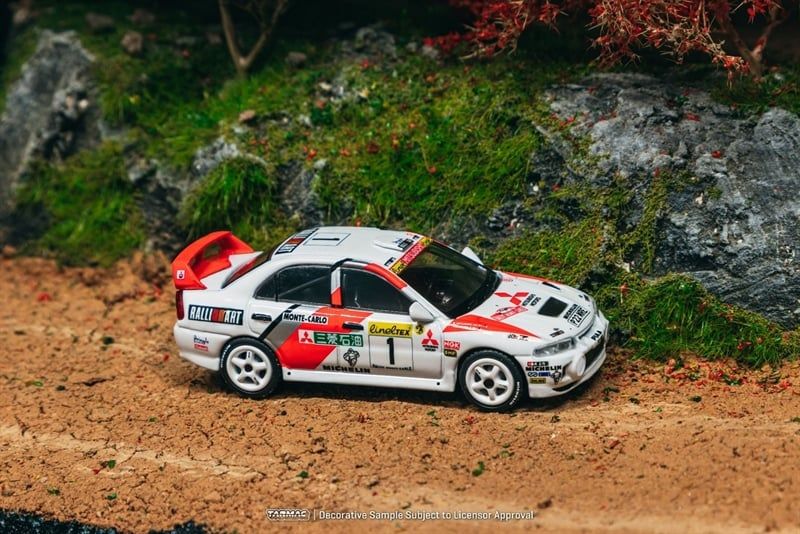 Mô hình xe Mitsubishi Lancer Evolution IV Rallye Monte-Carlo 1997 Tommi Mäkinen/ Seppo Harjanne tỉ lệ 1:64 Tarmac Works T64G-076-97MCR01
