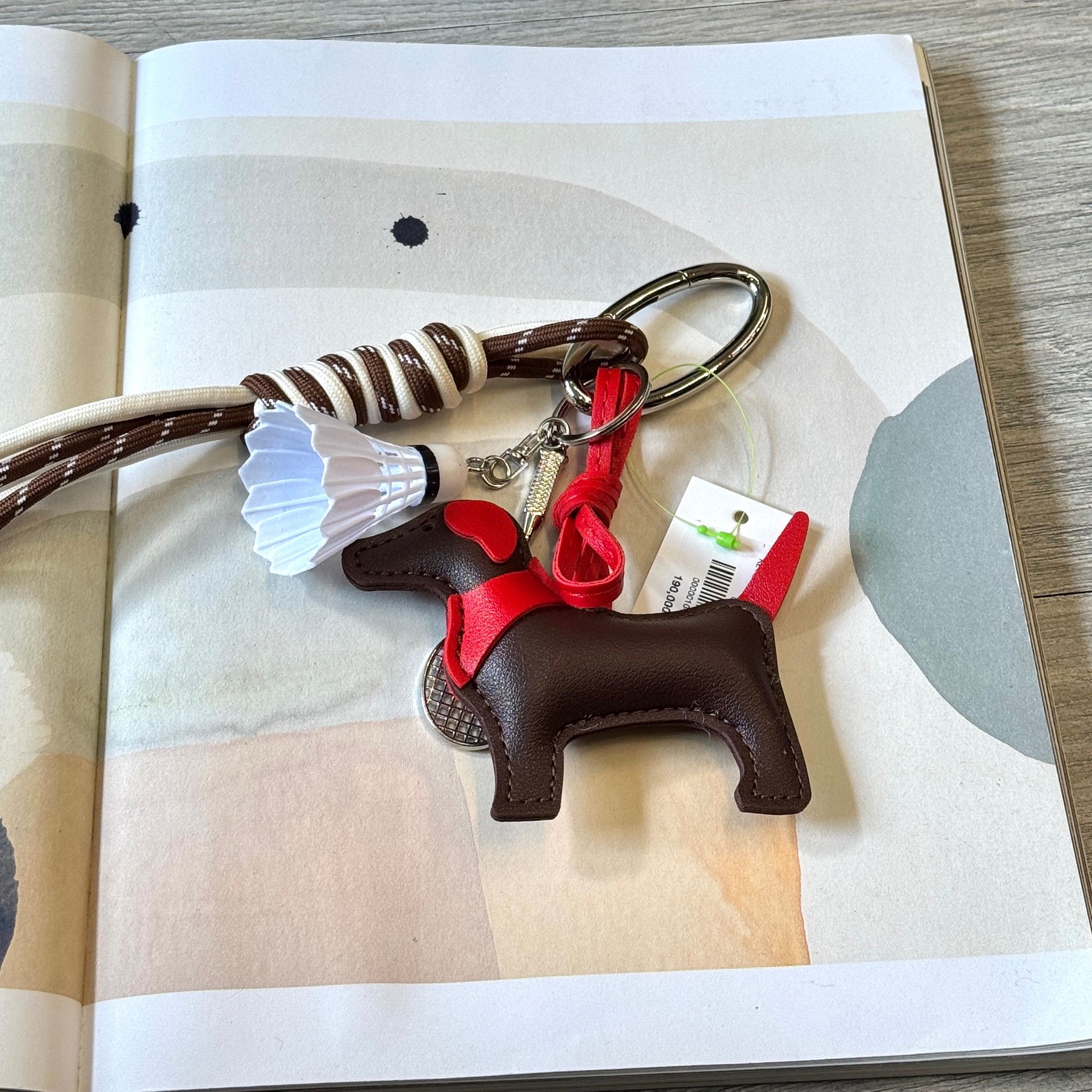 KEYCHAIN LITTLE DOG BADMINTON