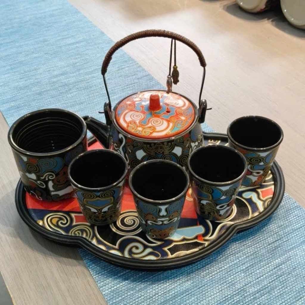 Bộ ấm chén gốm sứ hoa văn sặc sỡ BKCECN-9329