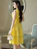 Đầm vàng nhún eo