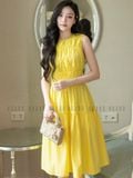 Đầm vàng nhún eo