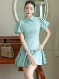 Đầm xanh mint tùng tầng