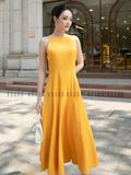 Đầm vàng cổ yếm