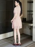 Đầm sọc cam đính nơ