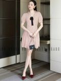 Đầm sọc cam đính nơ