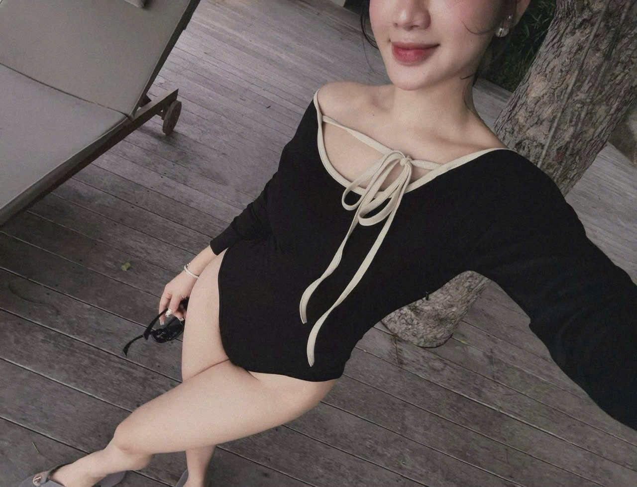 Bikini liền thân tay dài cột dây nơ viền kem siêu hot - T609