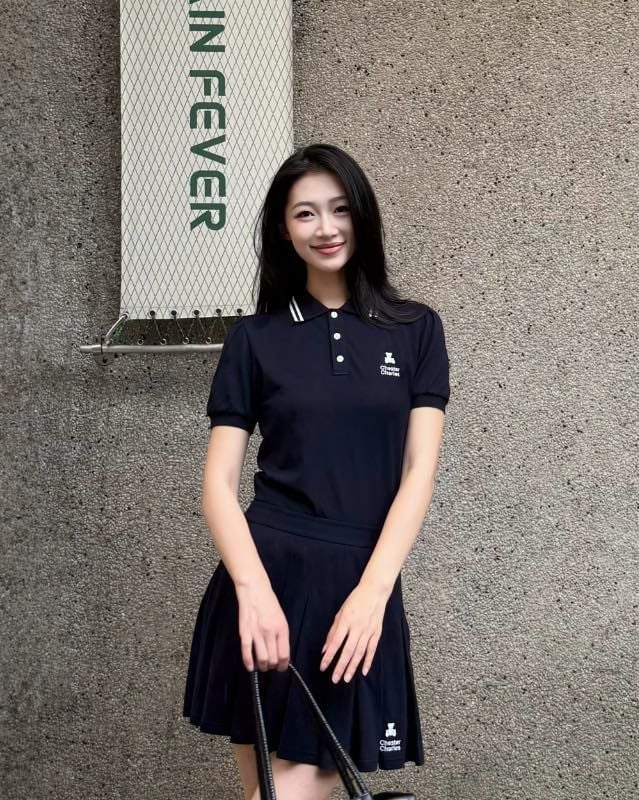 Bộ áo polo và chân váy ngắn xếp ly - xanh navy, gấu trắng trên chữ set