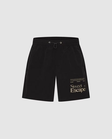 URBAN REVIVO - Quần short nam ống rộng lưng thun in chữ