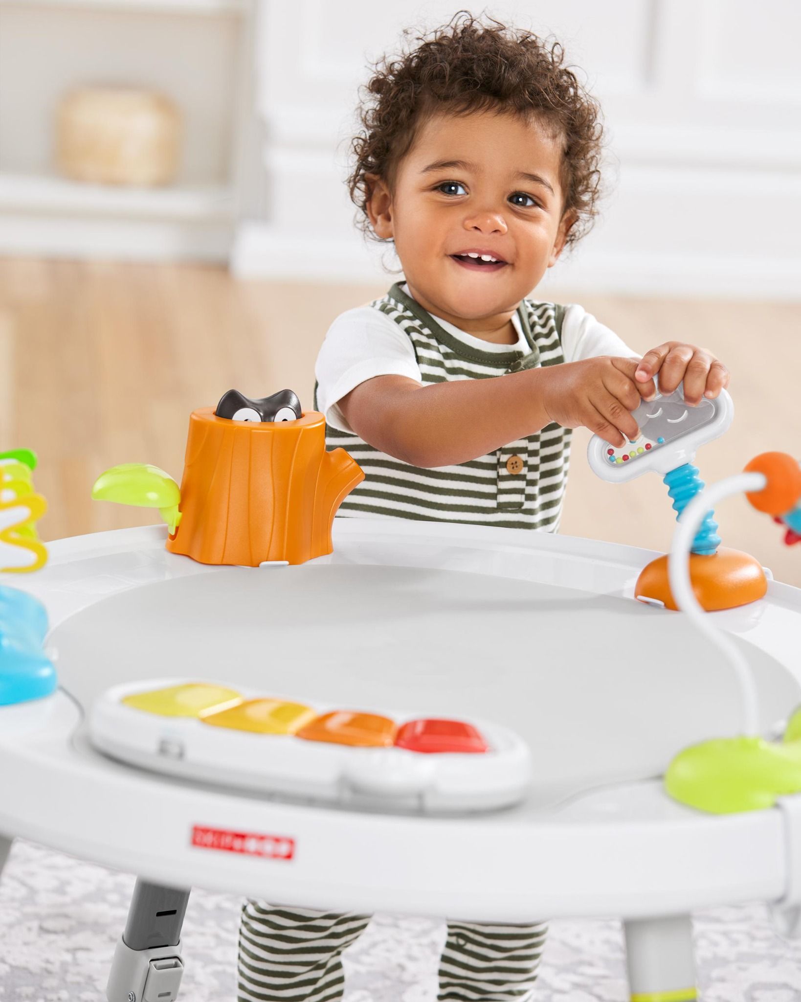 Ghế nhún Skip Hop Explore & More 3-Stage Activity Center