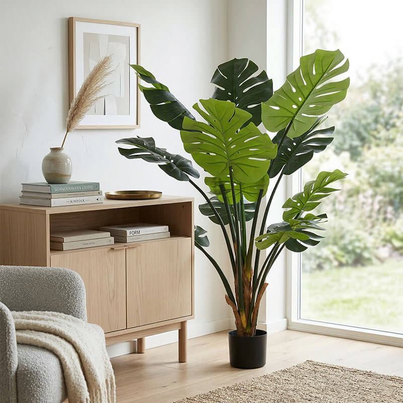 cây monstera giả trang trí phòng khách