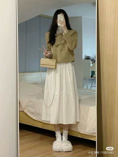 Vì sao chân váy dài qua gối vẫn dễ mặc