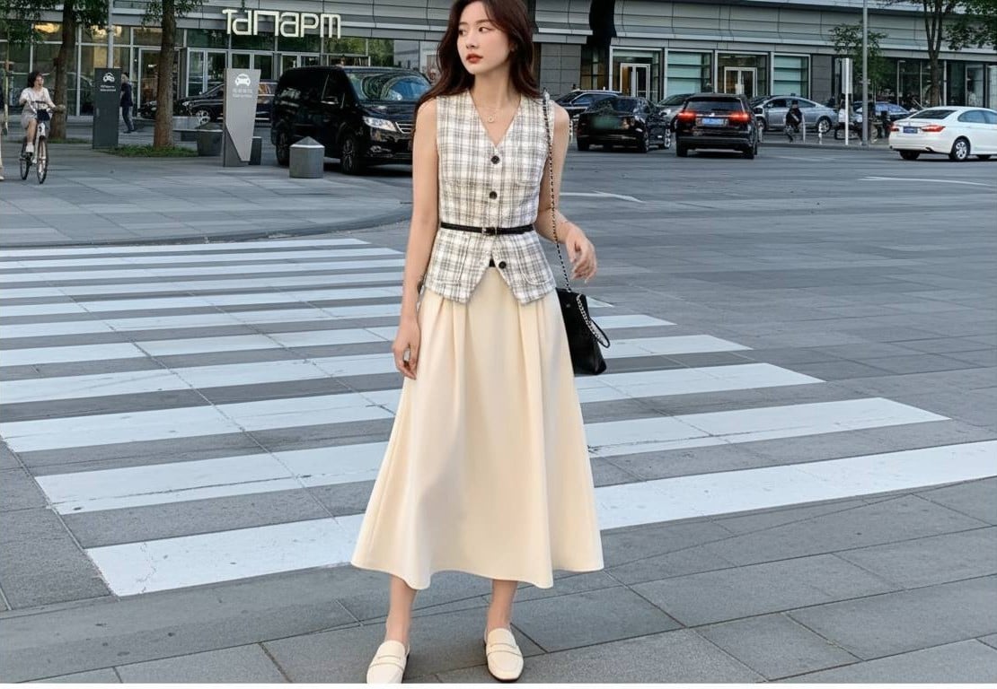 Áo gile len oversized phối chân váy midi mềm mại và thư thái