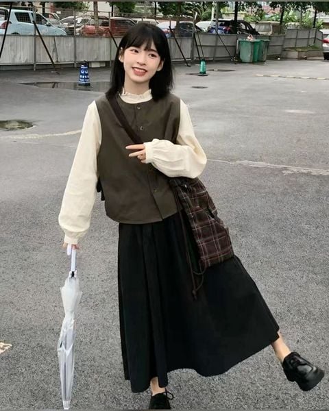 Cách phối đồ với chân váy dài qua gối - áo gile