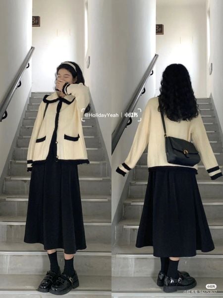 Chân váy xếp ly dài màu đen